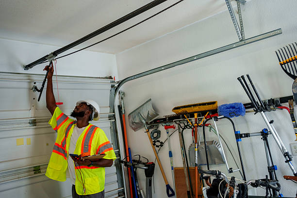 Professional Garage Door Panel Replacement technician working in Baudette, MN